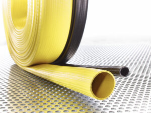 FLEXIBLE DE REFOULEMENT ENROULABLE A PLAT POUR AIR COMPRIME